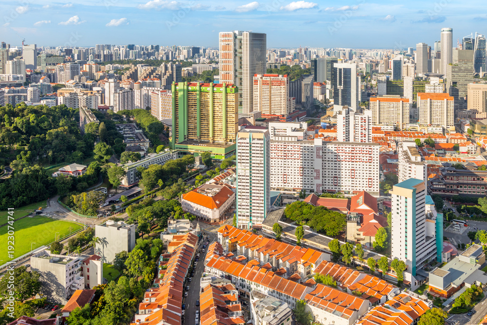 Obraz premium Cityscape of Singapore city showing residential quarter with red roof houses and high rise housing blocks
