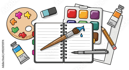 Colorful art supplies arranged on a with notebook and brushes