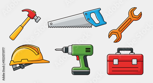 Collection of various construction tools on a light gray background