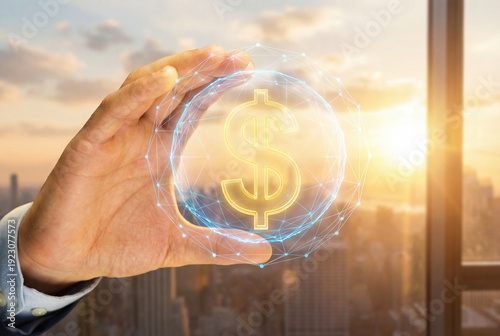 Businessman Hand Holding Glowing Dollar Sign Sphere with City Skyline Sunset