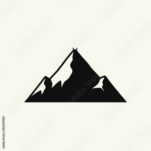 Black silhouette of a majestic mountain peak.