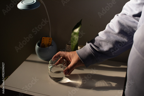 Man with glass of water