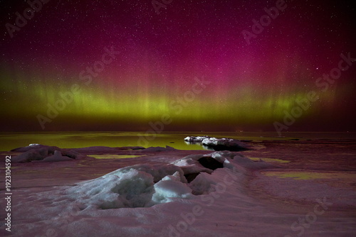 Vibrant Aurora Over Icy Baltic Coast in Lubmin