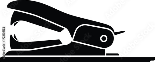 A black and white silhouette depicts a standard office stapler resting on a flat surface ready for use high quality professional