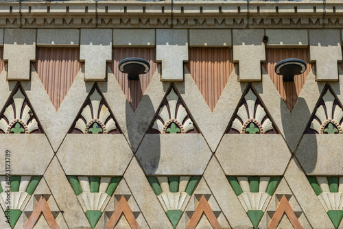 Art Deco Design in Stone and Tiles on the Wall of a Vintage Building in Detroit, Michigan, United States