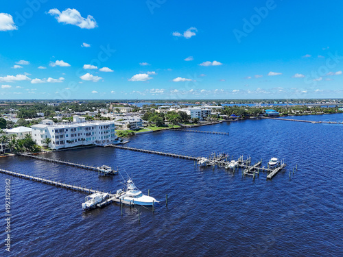 Waterfront homes and condos with boat docks near downtown Stuart located along the St Lucie River in Martin County, Florida. 