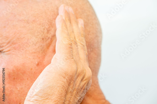 Принти на полотні Close-up elderly man's ear, showing details aged skin, wrinkles, and potential p