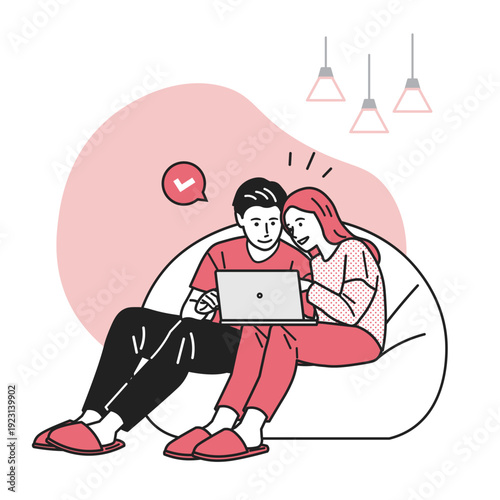 パソコンで入力や申込みをしているカップル