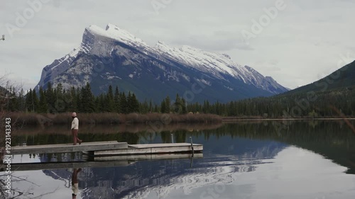 Wallpaper Mural Woman walking on dock at Vermilion Lakes with Mount Rundle in Banff National Park, Canada Torontodigital.ca