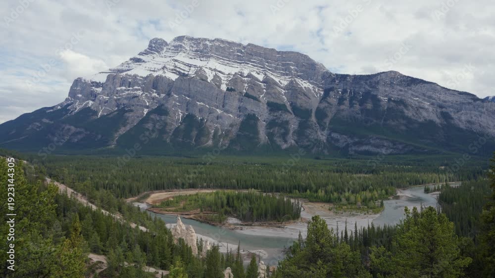 custom made wallpaper toronto digitalBanff landscape featuring forest, Bow River, hoodoos, and snow capped Mount Rundle under a cloudy sky