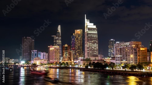 Ho Chi Minh City, Vietnam, June 23, 2025: Night Timelapse view of the Business District of Ho Chi Minh City (Saigon) in Vietnam. time lapse video.