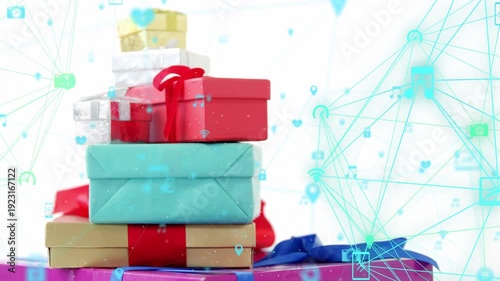 Teal web appearing, expanding, sending icons over gifts as camera panning up, showing connectivity