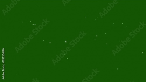 Slow motion real dust particles floating in air over jin green screen background. 4K