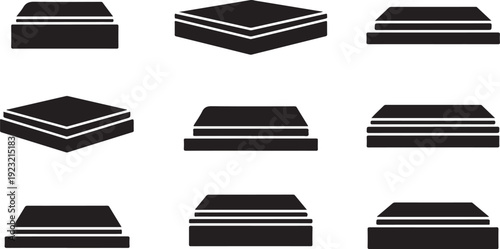 Black and white stack of books in various perspectives