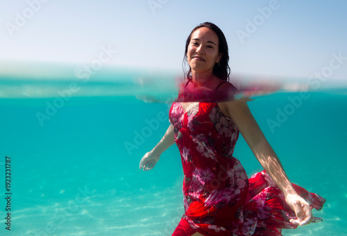 Carefree woman enjoying summer swim