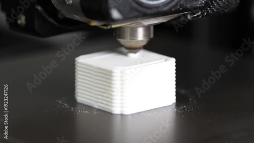 3D Printing Process Creating White Object.