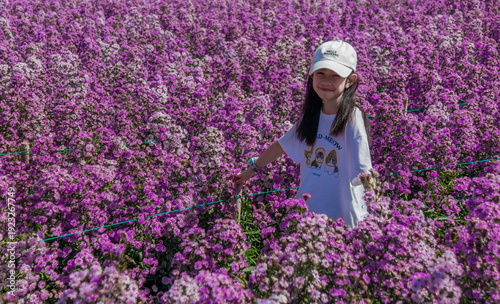 Girl in a Field of Purple Flowers