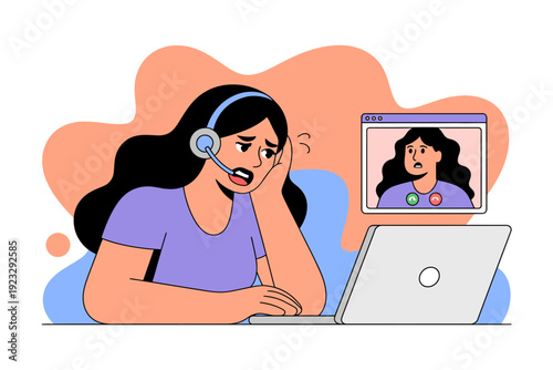 A frustrated woman wearing a headset and using a laptop for an online meeting or video call with another person on the screen