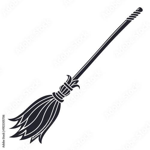 A black and white image of a broom