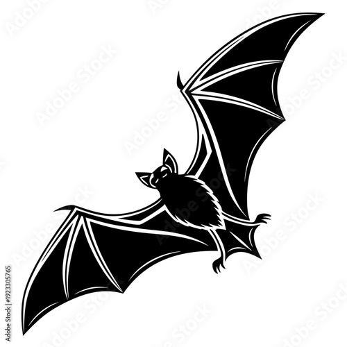 A black bat flying through the air with its wings spread wide