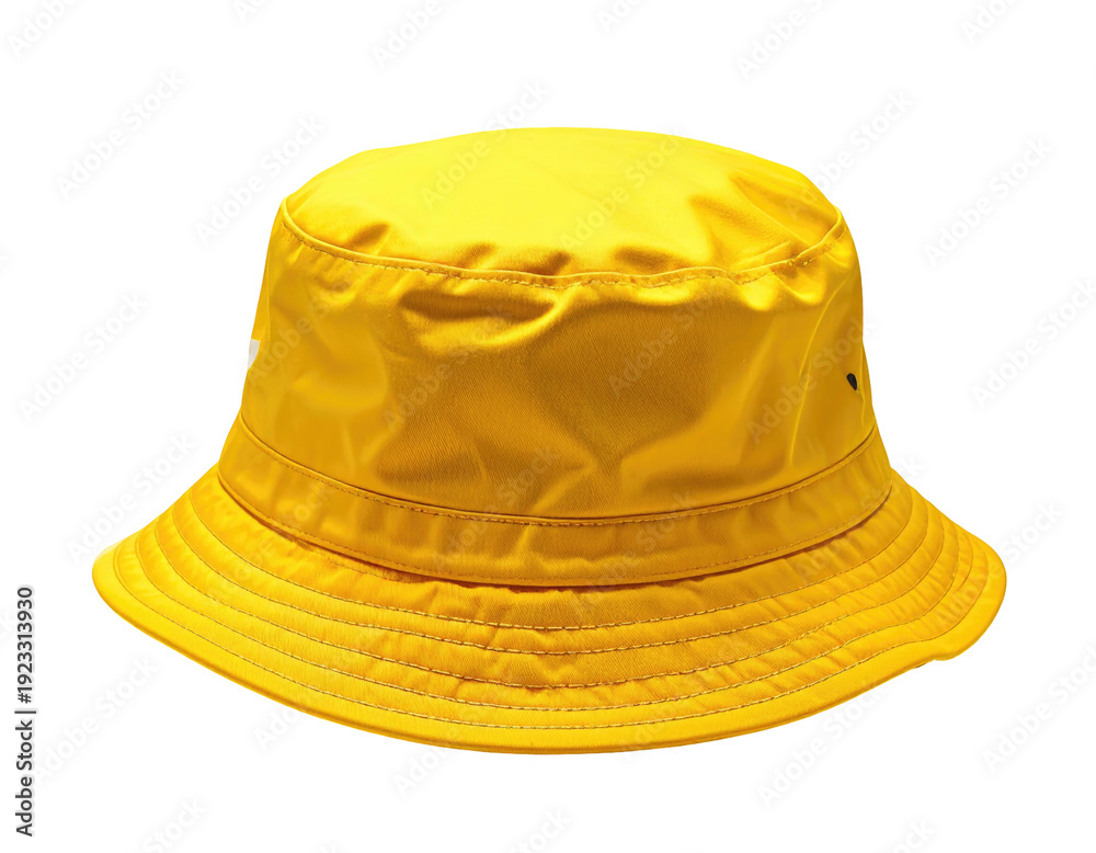 Fototapeta premium Bright yellow bucket hat isolated against a black background, close-up