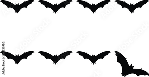 Flying silhouettes of bats in a symmetrical pattern with a lone bat breaking formation