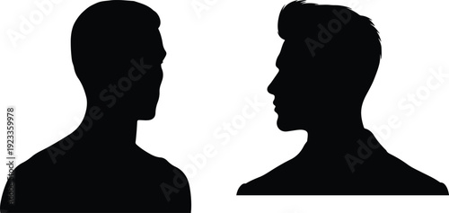 Contrasting silhouettes of two distinct male profiles facing opposite directions