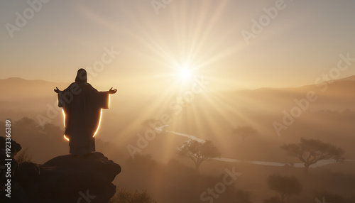 Radiant Golden Sunrise Bathes a Serene Statue on a Mountain Peak, Evoking Hope and Spiritual Reflection