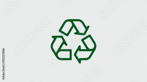 Green recycling symbol on gray background eco friendly logo for environmental conservation and sustainability