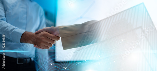 Close up of a real estate agent and client shaking hands for a successful home insurance deal or property mortgage. Concept of house buying, financial agreement, and investment security at office