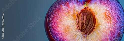Macro close-up of a juicy plum half with visible stone and vibrant flesh, sparkling water droplets.