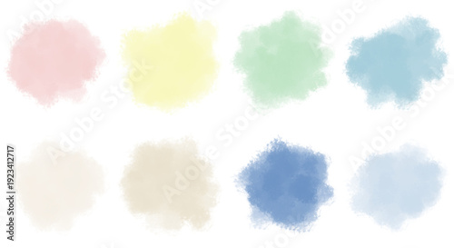 Set of eight watercolor paint splatters and brush strokes in pastel and muted colors on transparent background