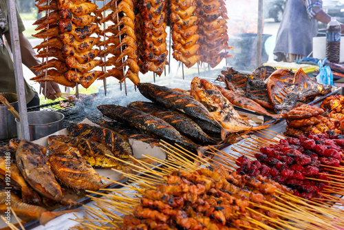 Grilled and barbecue fish and chicken wing and satay during Ramadan bazaar in Kota Kinabalu