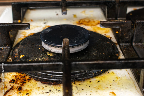Canvas Print Dirty Gas Stove Top with Grime and Stains in Kitchen