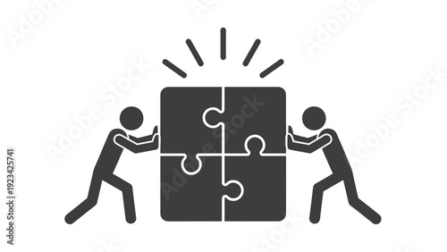 Two people collaborate to fit puzzle pieces together, symbolizing teamwork and shared problem solving.