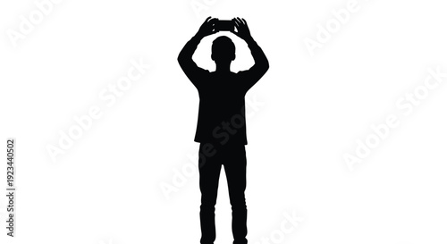 Black silhouette vector illustration of a young person holding a smartphone horizontally above their head to capture a photo or video memory.