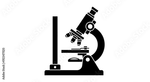 Black microscope on white background.