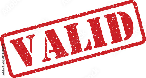Red ink stamp with the word VALID showing distressed texture on a white background
