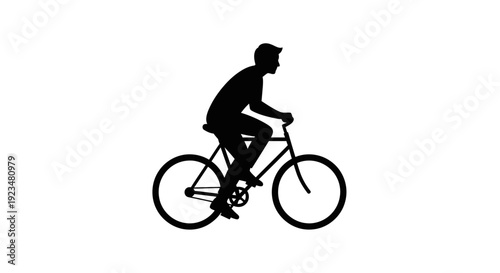 Man riding a bicycle fast outdoors.
