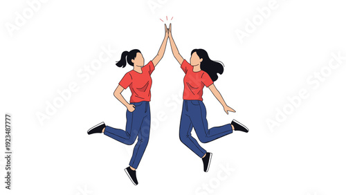 Two joyful young women wearing red t-shirts and jeans are jumping high in the air while giving a high five to celebrate their great success.