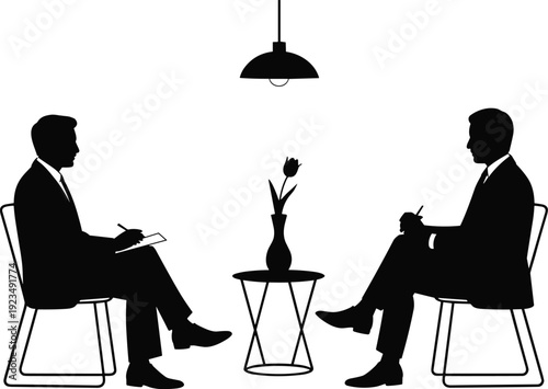 Silhouette of Two Men in Suits Talking in a Room with a Lamp and Vase business
