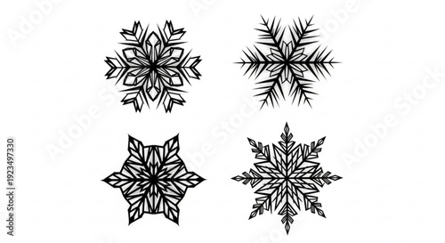 Four unique black snowflakes on white background winter icons frosty designs seasonal graphics