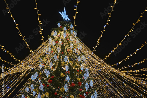 Wallpaper Mural KALININGRAD - YANVAR 12, 2026: Glowing garland on the New Year tree Torontodigital.ca