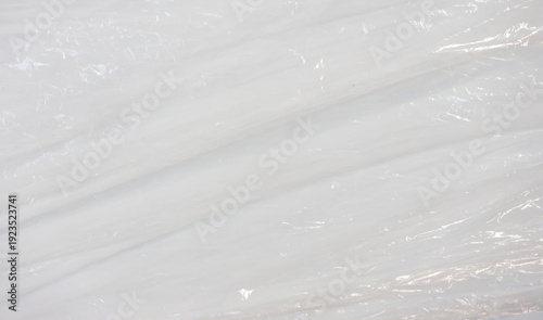 plastic overlay texture of realistic crumpled transparent plastic film wrap on white background