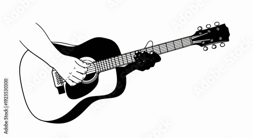 A hand strumming an acoustic guitar with a shadow cast by the instrument