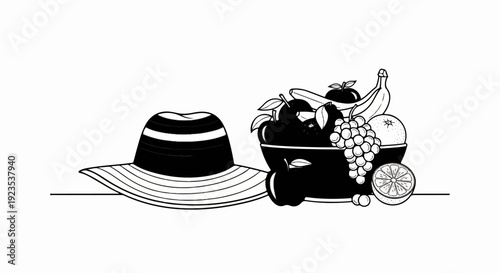 A striped hat sits next to a bowl of fruit, including grapes, apples, and bananas
