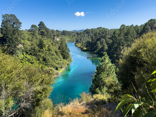Wallpaper Mural Waikato River at Taupō, New Zealand. Vibrant turquoise blue-green pure clear water. Spa Thermal Park on the right side. Torontodigital.ca