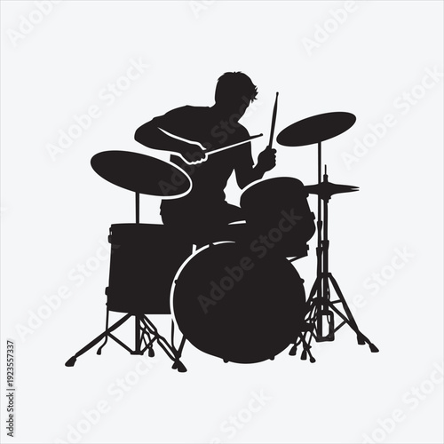 Rhythm of Precision: A dynamic silhouette of a drummer, passionately immersed in the art of percussion, commanding a full drum kit with rhythmic precision.