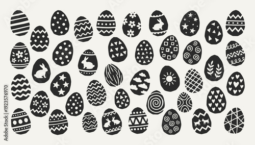 Easter egg silhouette collection. Black icons set - decorated eggs with stripes dots flowers stars rabbit hearts geometric patterns. Vector linocut style minimalist design elements.