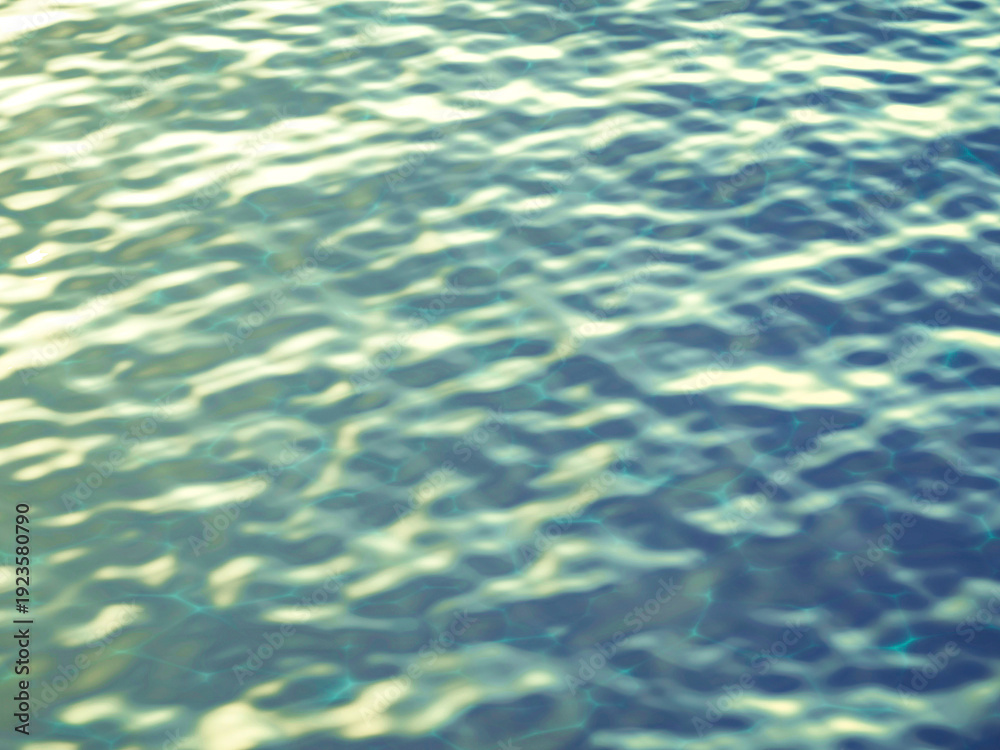 Fototapeta premium Teal and gold sunlit water ripples with soft morning light effects